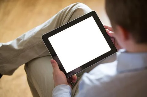 Young man with a tablet Stock Photos