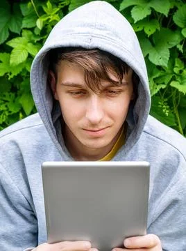 Young Man with a Tablet Stock-Fotos