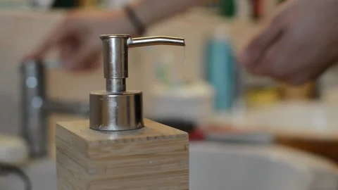 Young man take soap and washing his hands at the bathroom, defocused background Stock-Footage 167841833