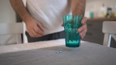 A young man takes a prep in a pill. HIV prevention concept. Stock Footage 169507863