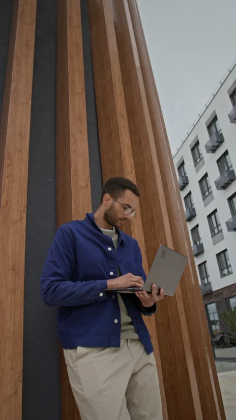 Young Man Taking Break to Look around Stock Footage 320015199