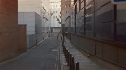 Young man taking a run through the city. Video stock 63022371