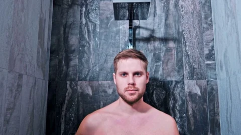 Young Man Taking A Shower Stock Footage 78630352