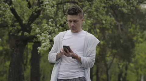 Young man talk to cellphone Stock Footage 62466284