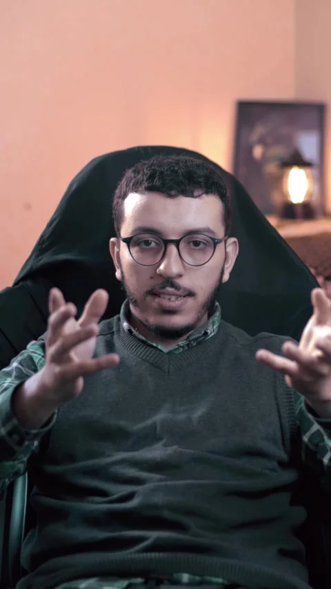 "Young Man Talking and Gesturing with Hands Indoors" Stock Footage 309770491