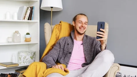 Young man talking and having video chat. Face time. ront-camera. Stock Footage 108789481