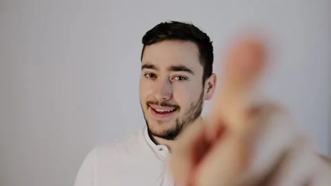 Young man talking to camera, young man pointing to camera, Stock Footage 132780681