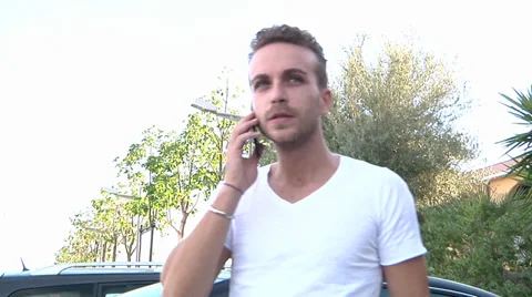Young man talking, cellphone, mobile device. Stock Footage 32263680