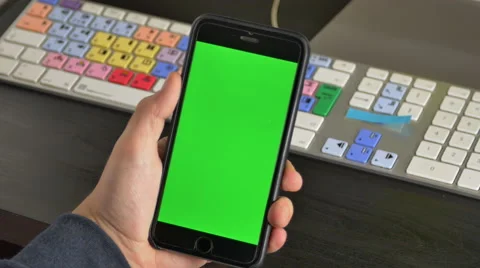 Young Man Talking On His Smartphone, Face Time, Green Screen Stock Footage 64044747