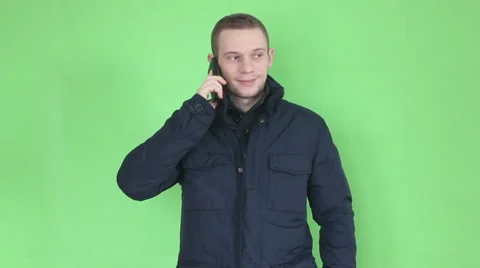 Young man talking at phone close up winter time Stock Footage 45696771
