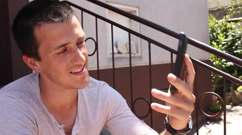 Young man talking on the phone Stock-Footage 59856384