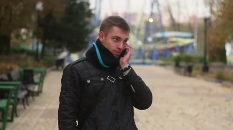 A young man talking on the phone Stock Footage 68921812