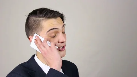 Young man talking on the phone Stockbeeldmateriaal 73665064