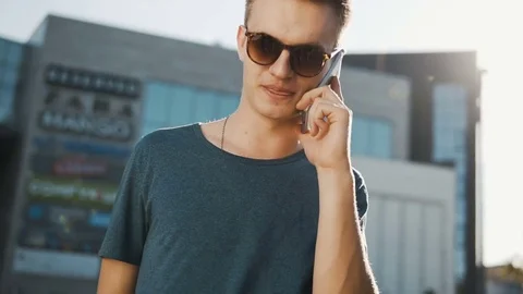 Young Man Talking Phone Видео 76921186