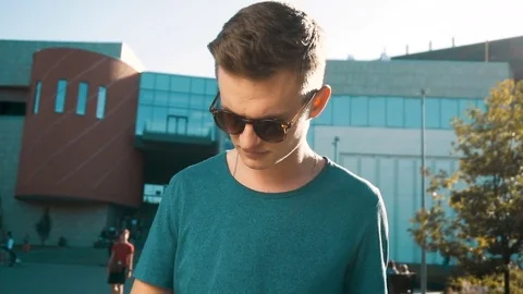Young Man Talking Phone Видео 76921503