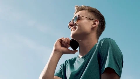 Young Man Talking Phone Stock Footage