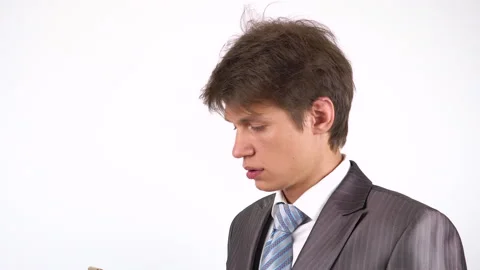 Young man talking on the phone 库存影片 92707704