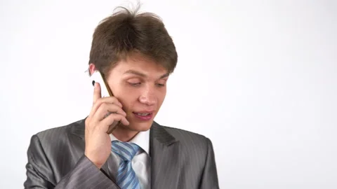 Young man talking on the phone Stock Footage 92710013