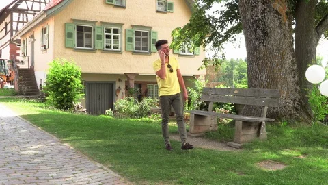Young man talking on the phone Stock Footage 112370686