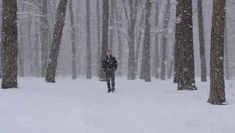 The young man talking by a telephone in the forest. Stock Footage 10809751