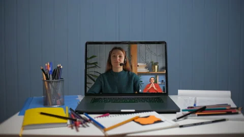 A young man is talking on a video call with a young woman. A friendly call Stock Footage 151707796