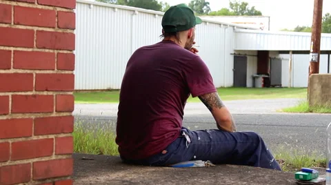 Young man with tattoos smoking Vídeo Stock 54099071
