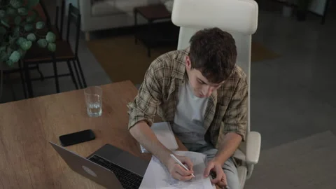 Young man technology blogger prepare for new video for new gadget Stock Footage 292563972