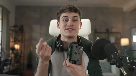Young man technology blogger record video blog or v-log set up device Stock Footage 292563145