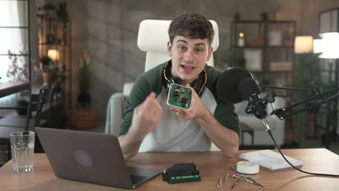 Young man technology blogger record video blog or v-log set up device Stock Footage 292563337