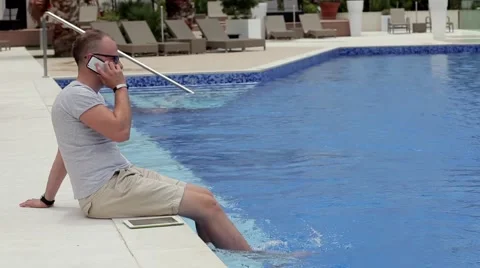 Young man telling his friend about his exotic holidays. Stock Footage 55281663