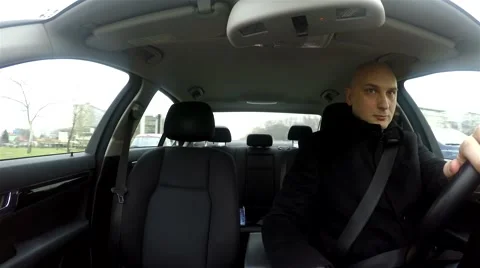 Young man texting and driving Stock Footage 47584649