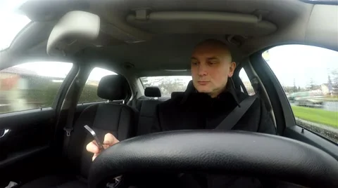 Young man texting and driving Stock Footage 47584758