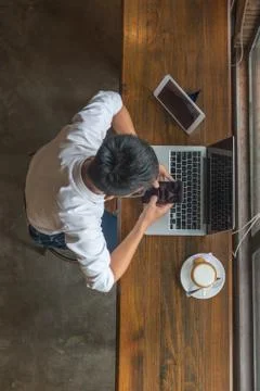 Young man texting message on smartphone Stock Photos