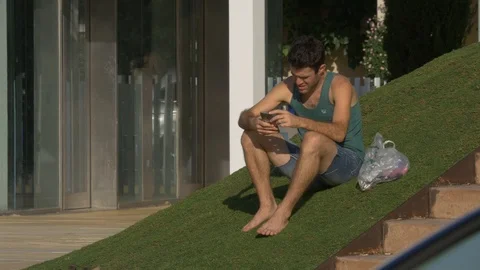 Young Man Texting On Smartphone Standing In Tel aviv , Israel Stock Footage 90362284