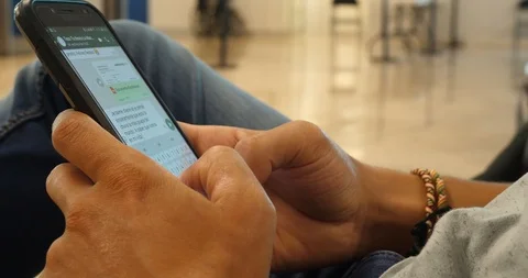 Young man texting writing on smart phone Stock Footage 118876927