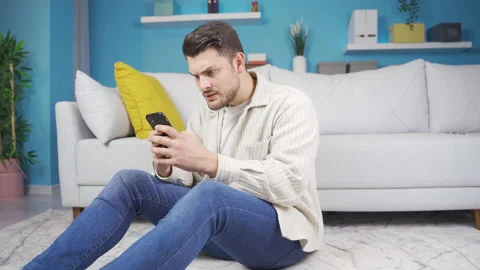 Young man texts in anger. Stock-Footage 233031184