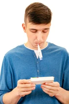 Young Man with a Thermometer Stock Photos