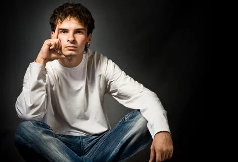 Young man thinking about something Stock Photos