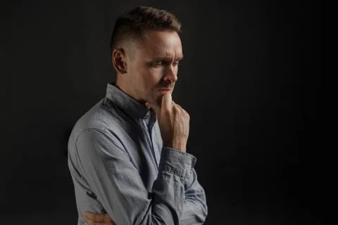 Young man thinking about something Stock Photos