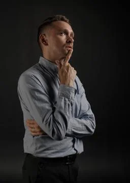 Young man thinking about something Stock Photos