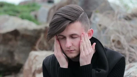 A young man thinking and concentrating on something Video stock 88886734