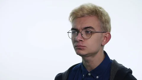 Young Man Thinking Close-up on white background Stock Footage 87790784