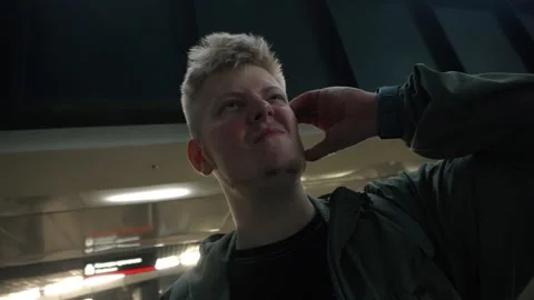 Young man thinking, feeling doubtful and confused Stock Footage 165645606