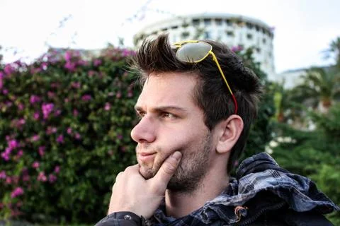 Young man thinking Stock Photos