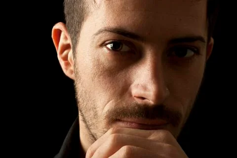 Young man thinking Stock Photos