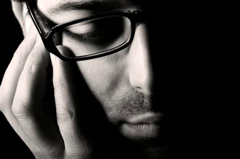 Young man thinking Stock Photos