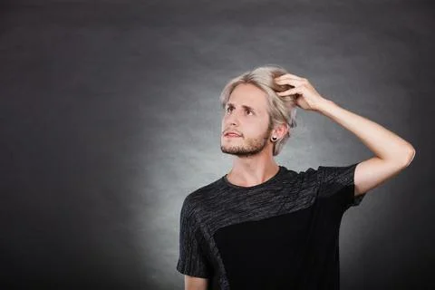 Young man thinking seek a solution Stock Photos