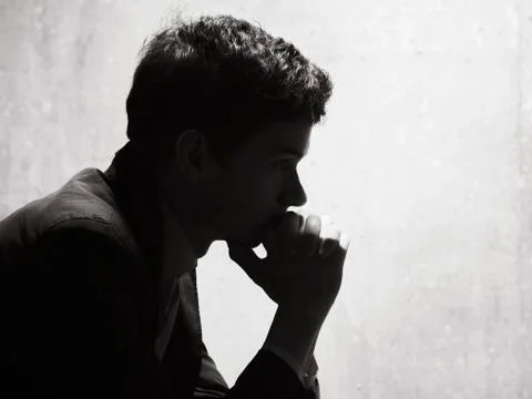 Young man in though Stock Photos
