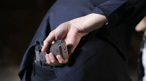 Young man threatening gun Stock Footage 65989308