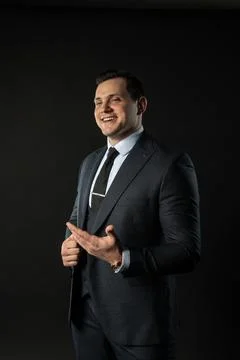 Young man three piece suit male fashion, young confident happy. Elegant city Foto stock